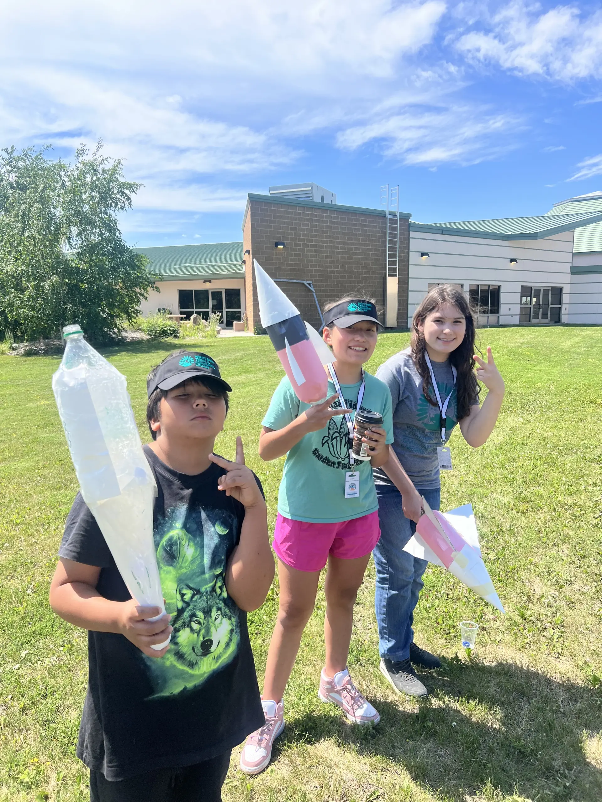 Students outside with equipment